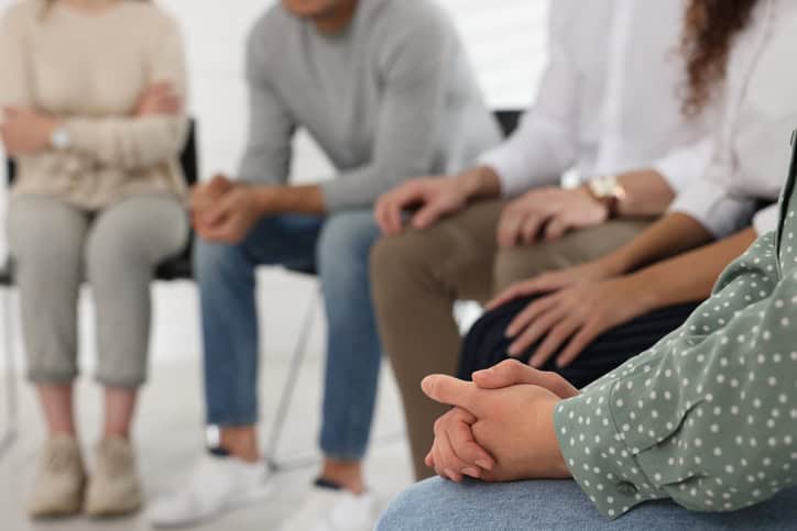 people sitting at support group event